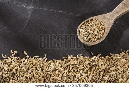 Dried Fennel Seeds In The Wooden Spoon - Foeniculum Vulgare