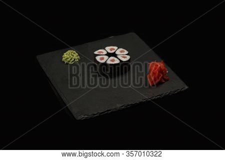 Various Sushi, Rolls On A Black Background With Reflection. Especially For Cafes And Restaurants On 