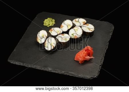 Various Sushi, Rolls On A Black Background With Reflection. Especially For Cafes And Restaurants On 