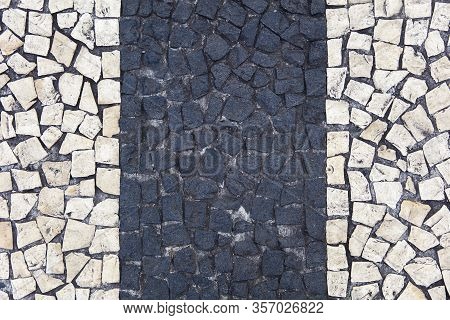 Closeup Surface Of The Blocky Pattern Old Stone Pavement