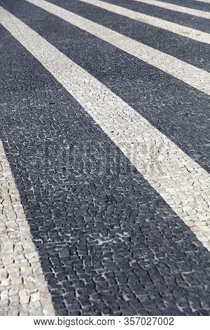 Closeup Surface Of The Blocky Pattern Old Stone Pavement