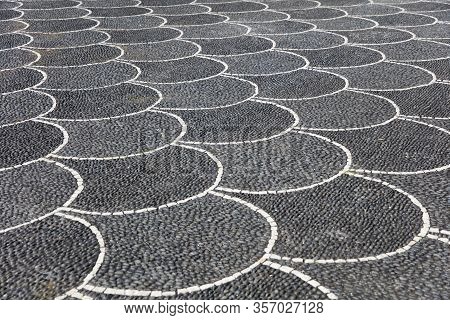 Closeup Surface Of The Blocky Pattern Old Stone Pavement