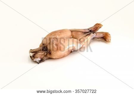 One Legs Of Fresh Frogs Isolated On White Background