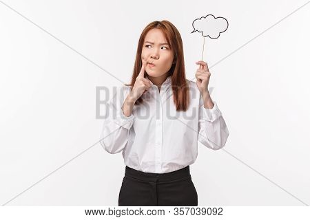 Holidays, Women And Lifestyle Concept. Portrait Of Thouhgtful Serious-looking Hesitant Asian Woman H
