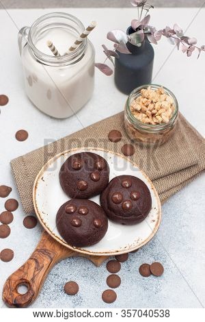 Chocolate Chip Cookies With Glass Of Milk On Gray Background