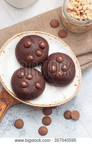 Chocolate Chip Cookies With Glass Of Milk On Gray Background