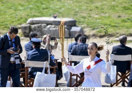 Olympic Flame Handover Ceremony For The Tokyo 2020 Summer Olympic Games At The Ancient Olympia