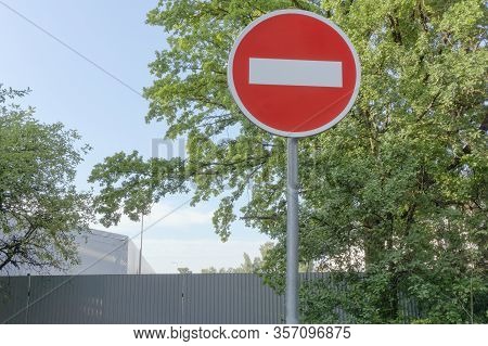 Road Sign Stop. No Entry. Fence In The Background, Closed Territory. Quarantine, Epidemic, Viral Dis