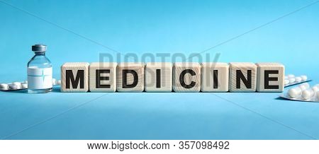 Medicine - Text On Cubes. Drug In Ambula, Tablets In Blisters To Reduce Disease Symptoms