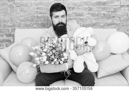 Romantic Gift. Macho Getting Ready Romantic Date. Man Wear Blue Tuxedo Bow Tie Hold Flowers Bouquet.