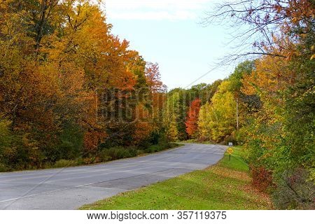 Striking Fall Foliage On The Road Near Wellesley Island State Park, New York,u.s.a