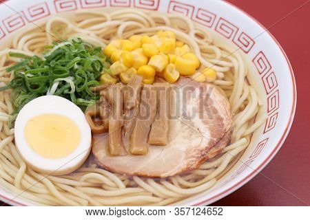 Japanese Soy Sauce Ramen Noodles In A Bowl On Table