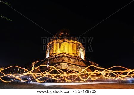Candle Lit Tradition In Temple Of Thailand