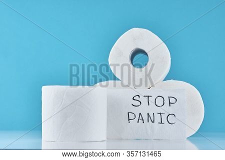 Consumer Buying Panic About Coronavirus Covid-19 Concept. Toilet Paper Rolls With Inscription Stop P