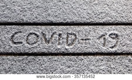 Covid-19. Inprint In Snow, Name Of New Coronavirus