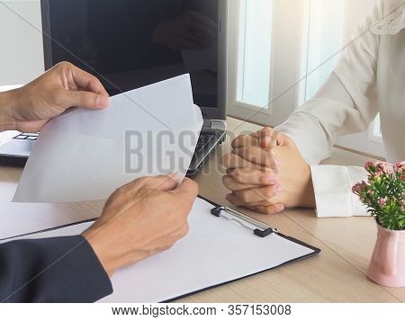 Women Work Out A Resignation Letter To The Staff Of The Scare. And The Boss Of The Scarecrow Is Open