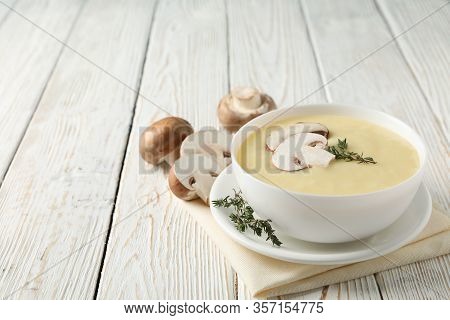 Mushroom Cream Soup On Wooden Background, Space For Text