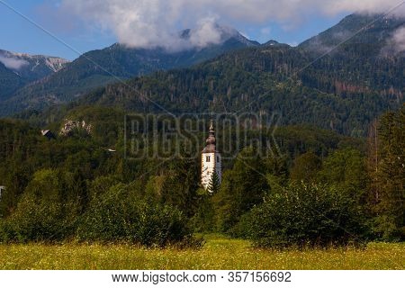 Bell Tower Of St John The Baptist Church In Bohinj, Slovenia