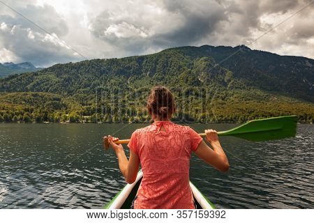 Girl Kayaking In The Scenic Bohinj Lake, Slovenia