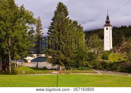 Bell Tower Of St John The Baptist Church In Bohinj, Slovenia