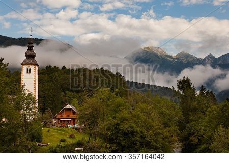 Bell Tower Of St John The Baptist Church In Bohinj, Slovenia