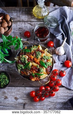 Pasta With Grilled Eggplant, Smoky Tomato Sauce And Basil Walnut Pistou. Style Vintage.selective Foc