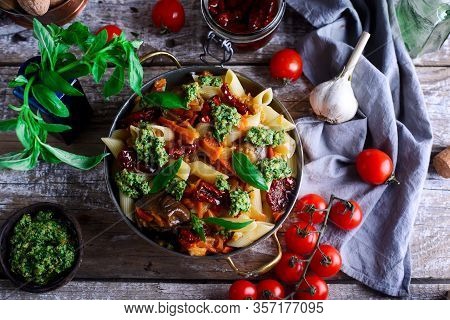 Pasta With Grilled Eggplant, Smoky Tomato Sauce And Basil Walnut Pistou. Style Vintage.selective Foc