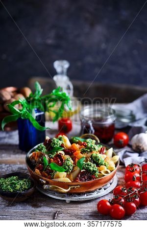 Pasta With Grilled Eggplant, Smoky Tomato Sauce And Basil Walnut Pistou. Style Vintage.selective Foc