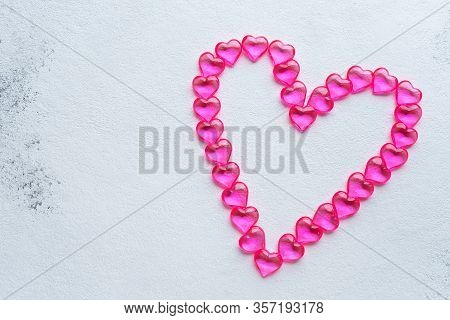 One Pink Heart On A White Background Top View, Copyspace