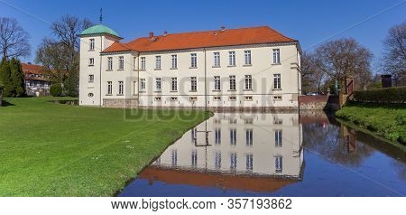 Panorama Of Castle Westerholt With Reflection In The Water In Germany