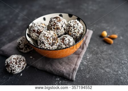 Energy Raw Walnut Balls In An Orange Bowl
