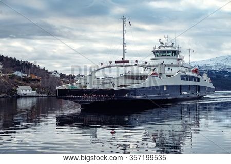 Ferry aproaching pier in Norway