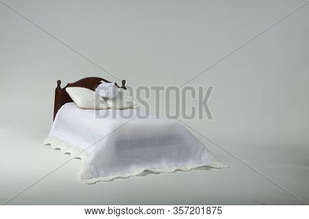 Light Covers Double Bed Isolated On Light Background. Image Contains Copy Space