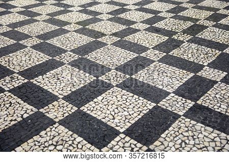 Closeup Surface Of The Blocky Pattern Old Stone Pavement