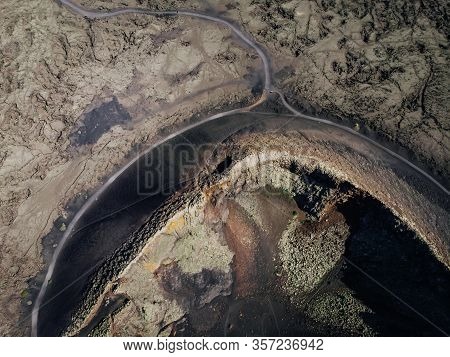 Aerial View Of The Extinct Crater Of A Volcano, An Analogy With The Surface Of The Moon.
