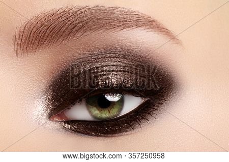 Beauty, Cosmetics And Makeup. Elegant Classical Smoky Make-up On Female Eyes. Beauty, Cosmetics And 