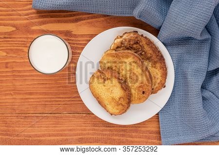 French Toast - Przenice - Slices Of Bread Soaked In Beaten Eggs And Milk And Fried, With A Glas Of Y