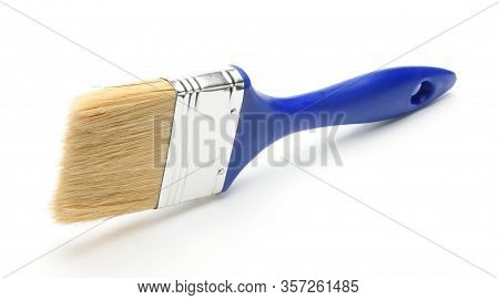 Blue Paint Brush On An Isolated White Background
