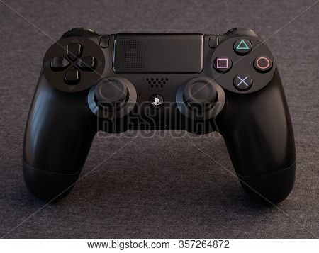 Uk, March 2020: Black Sony Ps4 Playstation Pad Controller From Above