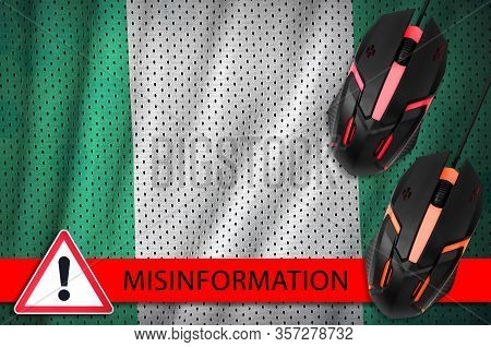 Nigeria Flag And Two Computer Mouses. Misinformation During Coronavirus Or 2019-ncov Virus Concept