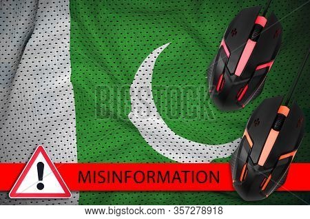 Pakistan Flag And Two Computer Mouses. Misinformation During Coronavirus Or 2019-ncov Virus Concept