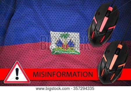 Haiti Flag And Two Computer Mouses. Misinformation During Coronavirus Or 2019-ncov Virus Concept