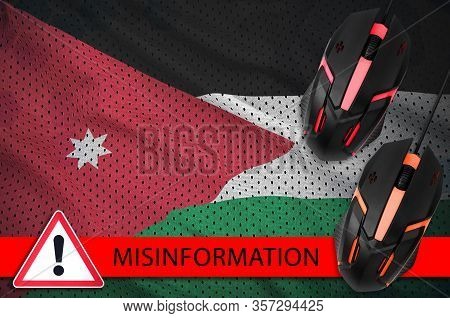 Jordan Flag And Two Computer Mouses. Misinformation During Coronavirus Or 2019-ncov Virus Concept