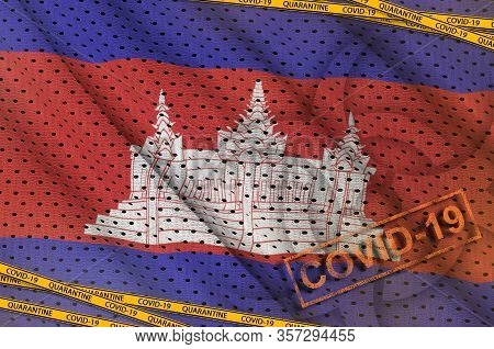 Cambodia Flag And Covid-19 Biohazard Symbol With Quarantine Orange Tape And Stamp. Coronavirus Or 20