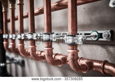 Plumbing service. copper pipeline of a heating system in boiler room