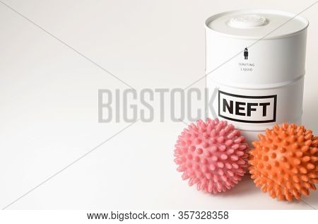 Barrel Labeled Oil And Spiked Balls Imitating A Coronavirus Symbolize The Threat Of Crisis And Pande