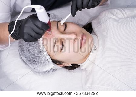 Cosmetologist Making Mesotherapy Injection. Microneedle Mesotherapy. Treatment Woman At Beautician. 