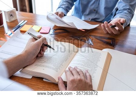 Teaching Helping And Study Course, Team Of Young Teacher Or Tutor Helps Students To Learning In Clas