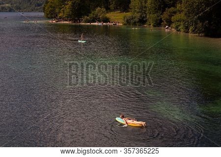 Bohinj, Slovenia - August, 03: Girl On Paddle Board In The Bohinj Lake On August 03, 2019