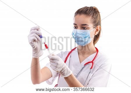 Female Doctor With A Stethoscope On Shoulder Holding Blood Test. Healthcare And Medical Concept.